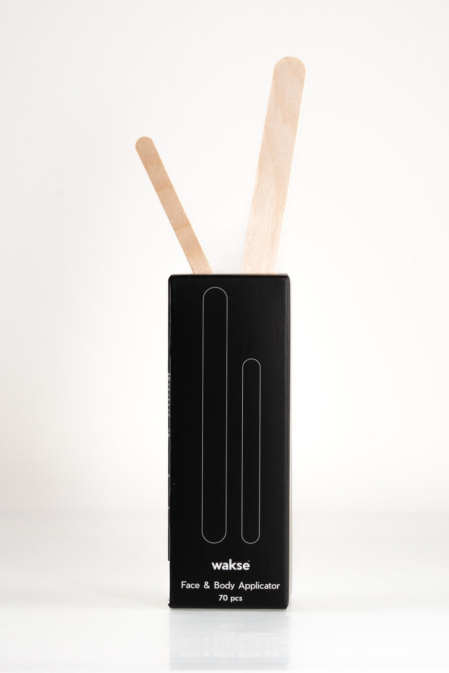 Face and body wax applicator set with wooden sticks in black box for easy waxing application
