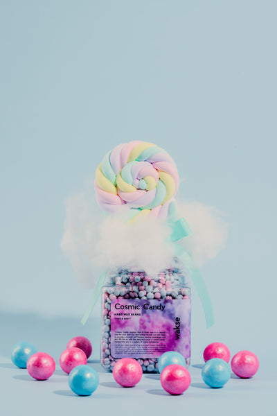 wakse Pastel candy-themed product with colorful lollipop and balls on a light blue background