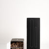 Black box and open white box with wooden sticks in face and body wax applicator set by Wakse